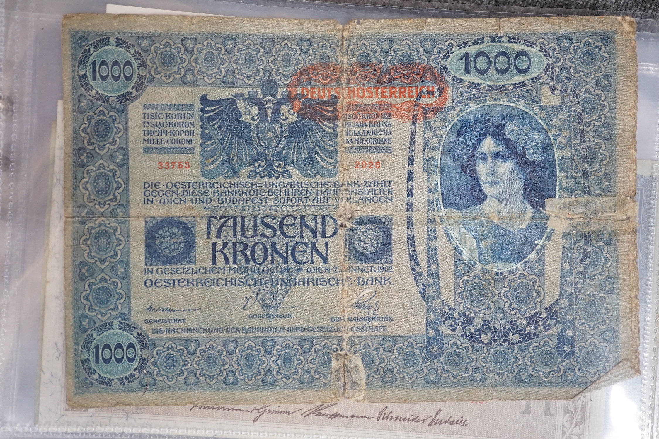 An album of over ninety various worldwide banknotes